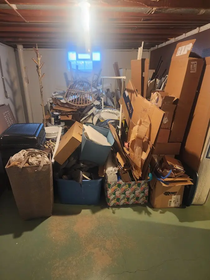 Roll-off dumpster container at job site for 20 Yard Dumpster Rental in Rindge